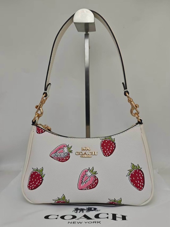 Coach Handbags - Coach White Leather Shoulder Bag with Strawberry Print